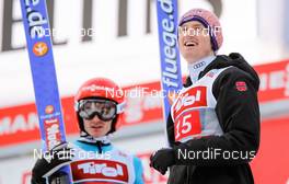 04.01.2015, Innsbruck, Austria (AUT): (l-r) Richard Freitag (GER) and Severin Freund (GER), Fischer - FIS world cup ski jumping, four hills tournament, individual HS130, Innsbruck (AUT). www.nordicfocus.com. © Laiho/NordicFocus. Every downloaded picture is fee-liable.