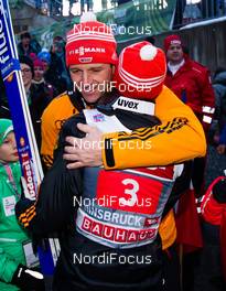 04.01.2015, Innsbruck, Austria (AUT): (l-r) Werner Schuster (AUT), the trainer of team Germany and Richard Freitag (GER) - FIS world cup ski jumping, four hills tournament, individual HS130, Innsbruck (AUT). www.nordicfocus.com. © Laiho/NordicFocus. Every downloaded picture is fee-liable.