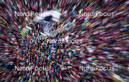 04.01.2015, Innsbruck, Austria (AUT): a jumper figer towards the audience - FIS world cup ski jumping, four hills tournament, individual HS130, Innsbruck (AUT). www.nordicfocus.com. © Laiho/NordicFocus. Every downloaded picture is fee-liable.