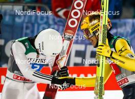 06.01.2015, Bischofshofen, Austria (AUT): (l-r) Jakub Janda (CZE) and Noriaki Kasai (JPN), Fischer - FIS world cup ski jumping, four hills tournament, individual HS140, Bischofshofen (AUT). www.nordicfocus.com. © Laiho/NordicFocus. Every downloaded picture is fee-liable.
