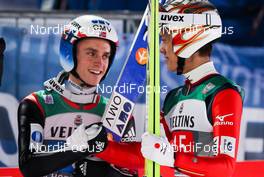 06.01.2015, Bischofshofen, Austria (AUT): (l-r) Anders Fannemel (NOR) and Taku Takeuchi (JPN), Fischer - FIS world cup ski jumping, four hills tournament, individual HS140, Bischofshofen (AUT). www.nordicfocus.com. © Laiho/NordicFocus. Every downloaded picture is fee-liable.