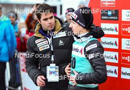 20.12.2015, Engelberg, Switzerland (SUI): (l-r) Christian Stahl (SUI), the press speaker of team Switzerland and Simon Ammann (SUI) - FIS world cup ski jumping, individual HS137, Engelberg (SUI). www.nordicfocus.com. © Laiho/NordicFocus. Every downloaded picture is fee-liable.