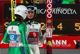 29.12.2015, Oberstdorf, Germany (GER): (l-r) Manuel Poppinger (AUT), Fischer and Anze Lanisek (SLO) - FIS world cup ski jumping, four hills tournament, individual HS137, Oberstdorf (GER). www.nordicfocus.com. © Laiho/NordicFocus. Every downloaded picture is fee-liable.