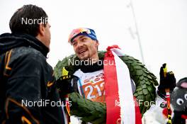 17.01.2015, Lienz, Austria (AUT): Eric Thomas (GER) talks to Franz Theurl (AUT) - FIS Marathon Cup Dolomitenlauf Classic, Lienz (AUT). www.nordicfocus.com. © Felgenhauer/NordicFocus. Every downloaded picture is fee-liable.