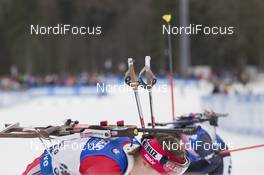 08.01.2016, Ruhpolding, Germany (GER): Event Feature: Athletes bend for removing their skis -  IBU world cup biathlon, sprint women, Ruhpolding replacing Oberhof (GER). www.nordicfocus.com. © Manzoni/NordicFocus. Every downloaded picture is fee-liable.
