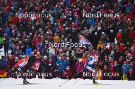 12.03.2016, Oslo, Norway (NOR): Scott Gow (CAN), Johannes Thingnes Boe (NOR) - IBU world championships biathlon, relay men, Oslo (NOR). www.nordicfocus.com. © Tumashov/NordicFocus. Every downloaded picture is fee-liable.