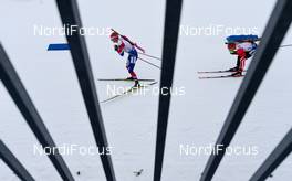 12.03.2016, Oslo, Norway (NOR): Johannes Thingnes Boe (NOR), Scott Gow (CAN) - IBU world championships biathlon, relay men, Oslo (NOR). www.nordicfocus.com. © Tumashov/NordicFocus. Every downloaded picture is fee-liable.