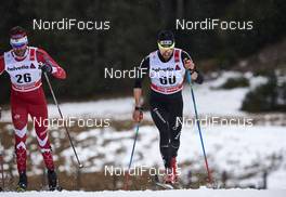 02.01.2016, Lenzerheide, Switzerland (SUI): Len Valjas (CAN), Ueli Schnider (SUI), (l-r)  - FIS world cup cross-country, tour de ski, mass men, Lenzerheide (SUI). www.nordicfocus.com. © Felgenhauer/NordicFocus. Every downloaded picture is fee-liable.