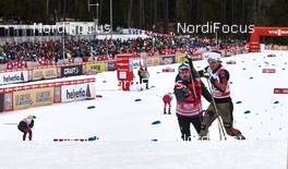 02.01.2016, Lenzerheide, Switzerland (SUI): Jonas Dobler (GER), gets a new pole  - FIS world cup cross-country, tour de ski, mass men, Lenzerheide (SUI). www.nordicfocus.com. © Felgenhauer/NordicFocus. Every downloaded picture is fee-liable.