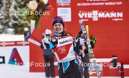 08.01.2016, Cortina-Toblach, Italy (ITA): Ingvild Flugstad Oestberg (NOR),  catch the flowers!  - FIS world cup cross-country, tour de ski, 5km women, Cortina-Toblach (ITA). www.nordicfocus.com. © Felgenhauer/NordicFocus. Every downloaded picture is fee-liable.