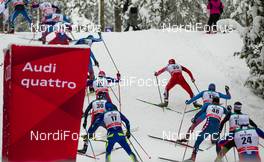 21.02.2016, Lahti, Finland (FIN): Group of skiers at the track and an Audi advertisement - FIS world cup cross-country, skiathlon men, Lahti (FIN). www.nordicfocus.com. © Laiho/NordicFocus. Every downloaded picture is fee-liable.