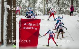 21.02.2016, Lahti, Finland (FIN): Group of skiers at the track and an Audi advertisement - FIS world cup cross-country, skiathlon men, Lahti (FIN). www.nordicfocus.com. © Laiho/NordicFocus. Every downloaded picture is fee-liable.
