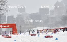 02.03.2016, Montreal, Canada (CAN): athletes in front of Montreal skyline   - FIS world cup cross-country, mass women, Montreal (CAN). www.nordicfocus.com. © Felgenhauer/NordicFocus. Every downloaded picture is fee-liable.