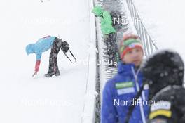31.01.2016, Seefeld, Austria (AUT): Austrian Coach checks the snow on the hill   - FIS world cup nordic combined, individual gundersen HS109/15km, Seefeld (AUT). www.nordicfocus.com. © Modica/NordicFocus. Every downloaded picture is fee-liable.