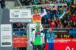 01.01.2016, Garmisch, Germany (GER): (l-r) the winner Peter Prevc (SLO) carried by Robert Kranjec (SLO), behind the FIS race director Walter Hofer (AUT) - FIS world cup ski jumping, four hills tournament, individual HS140, Garmisch (GER). www.nordicfocus.com. © Laiho/NordicFocus. Every downloaded picture is fee-liable.