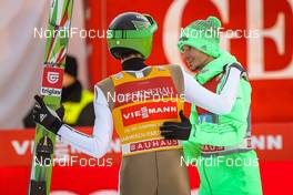 01.01.2016, Garmisch, Germany (GER): (l-r) Peter Prevc (SLO) and Robert Kranjec (SLO) - FIS world cup ski jumping, four hills tournament, individual HS140, Garmisch (GER). www.nordicfocus.com. © Laiho/NordicFocus. Every downloaded picture is fee-liable.