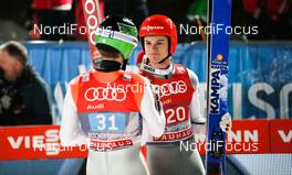 06.01.2016, Bischofshofen, Austria (AUT): (l-r) Jurij Tepes (SLO) and Andreas Wank (GER) - FIS world cup ski jumping, four hills tournament, individual HS140, Bischofshofen (AUT). www.nordicfocus.com. © Laiho/NordicFocus. Every downloaded picture is fee-liable.