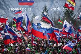 19.03.2016, Planica, Slovenia (SLO): Slovenian flags held by supporters of the slovenian team   - FIS world cup ski flying, team HS225, Planica (SLO). www.nordicfocus.com. © Modica/NordicFocus. Every downloaded picture is fee-liable.