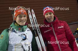 26.11.2017, Oestersund, Sweden, (SWE): Benedikt Doll (GER), Peter Blom (SWE), Madshus Race Service, (l-r) - IBU world cup biathlon, relay mixed, Oestersund (SWE). www.nordicfocus.com. © Manzoni/NordicFocus. Every downloaded picture is fee-liable.