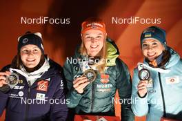 02.12.2017, Oestersund, Sweden, (SWE): Justine Braisaz (FRA), Denise Herrmann (GER), Yuliia Dzhima (UKR) - IBU world cup biathlon, award and pricegiving ceremony, Oestersund (SWE). www.nordicfocus.com. © Tumashov/NordicFocus. Every downloaded picture is fee-liable.