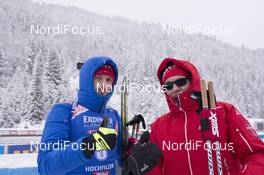 09.12.2017, Hochfilzen, Austria (AUT): Jakov Fak (SLO), Ole Bjoern Tretterud (NOR), Swix race service, (l-r) -  IBU world cup biathlon, pursuit men, Hochfilzen (AUT). www.nordicfocus.com. © Manzoni/NordicFocus. Every downloaded picture is fee-liable.