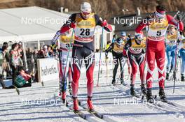 01.01.2017, Val Mustair, Switzerland (SUI): Niklas Dyrhaug (NOR), Alex Harvey (CAN), (l-r)  - FIS world cup cross-country, tour de ski, mass men, Val Mustair (SUI). www.nordicfocus.com. © Modica/NordicFocus. Every downloaded picture is fee-liable.