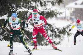 10.12.2017, Davos, Switzerland (SUI): Lucas Boegl (GER), Devon Kershaw (CAN), (l-r)  - FIS world cup cross-country, 15km men, Davos (SUI). www.nordicfocus.com. © Modica/NordicFocus. Every downloaded picture is fee-liable.