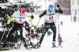 10.12.2017, Davos, Switzerland (SUI): Paul Constantin Pepene (ROU), Lucas Boegl (GER), (l-r)  - FIS world cup cross-country, 15km men, Davos (SUI). www.nordicfocus.com. © Modica/NordicFocus. Every downloaded picture is fee-liable.
