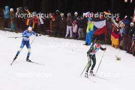 06.01.2018, Oberhof, Germany (GER): Sergey Bocharnikov (BLR), Benedikt Doll (GER), (l-r) -  IBU world cup biathlon, pursuit men, Oberhof (GER). www.nordicfocus.com. © Manzoni/NordicFocus. Every downloaded picture is fee-liable.