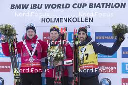 15.03.2018, Oslo, Norway (NOR): Johannes Thingnes Boe (NOR), Henrik L'abee-Lund (NOR), Martin Fourcade (FRA), (l-r) - IBU world cup biathlon, sprint men, Oslo (NOR). www.nordicfocus.com. © Manzoni/NordicFocus. Every downloaded picture is fee-liable.