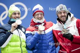 10.02.2018, Pyeongchang, Korea (KOR): Jakov Fak (SLO), Johannes Thingnes Boe (NOR), Dominik Landertinger (AUT), (l-r) - XXIII. Olympic Winter Games Pyeongchang 2018, biathlon, medals, Pyeongchang (KOR). www.nordicfocus.com. © Modica/NordicFocus. Every downloaded picture is fee-liable.