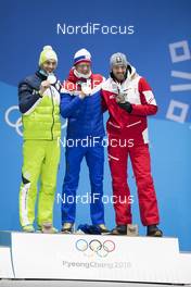 16.02.2018, Pyeongchang, Korea (KOR): Jakov Fak (SLO), Johannes Thingnes Boe (NOR), Dominik Landertinger (AUT), (l-r) - XXIII. Olympic Winter Games Pyeongchang 2018, biathlon, medals, Pyeongchang (KOR). www.nordicfocus.com. © Manzoni/NordicFocus. Every downloaded picture is fee-liable.