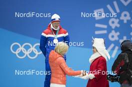16.02.2018, Pyeongchang, Korea (KOR): Johannes Thingnes Boe (NOR), Nicole Resch (GER) IBU secretary general, (l-r) - XXIII. Olympic Winter Games Pyeongchang 2018, biathlon, medals, Pyeongchang (KOR). www.nordicfocus.com. © Manzoni/NordicFocus. Every downloaded picture is fee-liable.