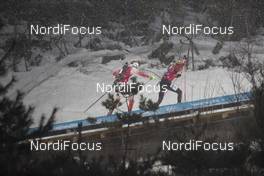 22.02.2018, Pyeongchang, Korea (KOR): Monika Hojnisz (POL), Elisa Gasparin (SUI), (l-r) - XXIII. Olympic Winter Games Pyeongchang 2018, biathlon, relay women, Pyeongchang (KOR). www.nordicfocus.com. © Manzoni/NordicFocus. Every downloaded picture is fee-liable.