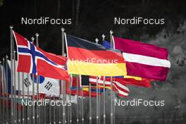 10.02.2018, Pyeongchang, Korea (KOR): Event Feature: Norwegian, German and Latvian Flag in the strong wind - XXIII. Olympic Winter Games Pyeongchang 2018, biathlon, sprint women, Pyeongchang (KOR). www.nordicfocus.com. © Manzoni/NordicFocus. Every downloaded picture is fee-liable.