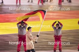 09.02.2018, Pyeongchang, Korea (KOR): Erik Frenzel (GER) carries the german Flag - XXIII. Olympic Winter Games Pyeongchang 2018, opening ceremony, Pyeongchang (KOR). www.nordicfocus.com. © Manzoni/NordicFocus. Every downloaded picture is fee-liable.
