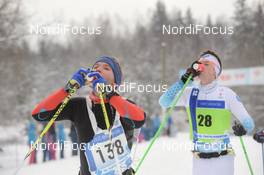 18.02.2018, Tartu, Estonia (EST): The Eating point at the track, KAUPO Tammemaee (EST), PEETER Poopuu (EST) - FIS World Loppet Tartu Marathon, Tartu (EST). www.nordicfocus.com. © Tumashov/NordicFocus. Every downloaded picture is fee-liable.