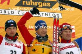 26.03.2006, Holmenkollen, Norway (NOR) Roman Dostal (CZE), Ole Einar Bjoerndalen (NOR), Sergei Rozhkov (RUS), (l-r) - IBU World Cup Biathlon, mass start men, Holmenkollen (NOR). www.nordicfocus.com. © Manzoni/NordicFocus. Every downloaded picture is fee-liable.