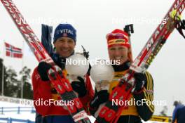 26.03.2006, Holmenkollen, Norway (NOR) Ole Einar Bjoerndalen (NOR), Kati Wilhelm (GER), (l-r) - IBU World Cup Biathlon, mass start women, Holmenkollen (NOR). www.nordicfocus.com. © Manzoni/NordicFocus. Every downloaded picture is fee-liable.