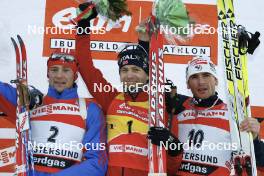 Biathlon - IBU World Cup Biathlon pursuit men 15km - Ostersund (SWE): Dmitri Iarochenko (RUS, left), Ole Einar Bjoerndalen (NOR, center), Raphael Poiree (FRA). www.nordicfocus.com. © Manzoni/NordicFocus. Every downloaded picture is fee-liable.