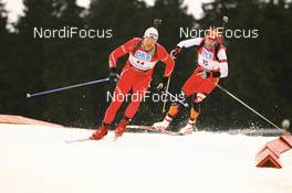 Biathlon - IBU World Cup Biathlon pursuit men 12.5km in the Rennsteig-Arena - Oberhof (GER): Halvard Hanevold (NOR), Christoph Sumann (AUT).