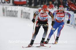 Biathlon - IBU World Cup Biathlon relay women 4x6km - Hochfilzen (AUT): Kati Wilhelm (GER), Natalia Guseva (RUS).