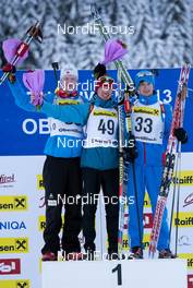 26.01.2013, Obertillach, Austria (AUT): Johannes Thingnes BOE (NOR) - Alexandr LOGINOV (RUS) -Maxim TSVETKOV (RUS) - IBU Youth and Junior world ski championships biathlon, individual men sprint, Obertillach (AUT). www.nordicfocus.com. © Wukits/NordicFocus. Every downloaded picture is fee-liable.