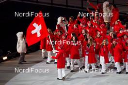 07.02.2014, Sochi, Russia (RUS): Simon Ammann (SUI) carrying the flag - XXII. Olympic Winter Games Sochi 2014, opening ceremony, Sochi (RUS). www.nordicfocus.com. © NordicFocus. Every downloaded picture is fee-liable.