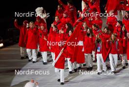 07.02.2014, Sochi, Russia (RUS): Simon Ammann (SUI) carrying the flag - XXII. Olympic Winter Games Sochi 2014, opening ceremony, Sochi (RUS). www.nordicfocus.com. © NordicFocus. Every downloaded picture is fee-liable.