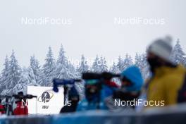 07.01.2021, Oberhof, Germany (GER): Event Feature: IBU Logo on the screen and coaches in front -  IBU World Cup Biathlon, training, Oberhof (GER). www.nordicfocus.com. © Manzoni/NordicFocus. Every downloaded picture is fee-liable.