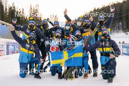 18.02.2021, Pokljuka, Slovenia (SLO):  Sebastian Samuelsson (SWE), Hanna Oeberg (SWE) celebrate with Team Sweden - IBU World Championships Biathlon, single mixed relay, Pokljuka (SLO). www.nordicfocus.com. © Thibaut/NordicFocus. Every downloaded picture is fee-liable.