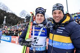 21.01.2023, Antholz, Italy (ITA): Martin Ponsiluoma (SWE), Jean-Marc Chabloz (SUI), coach Team Sweden, (l-r) - IBU World Cup Biathlon, pursuit men, Antholz (ITA). www.nordicfocus.com. © Manzoni/NordicFocus. Every downloaded picture is fee-liable.