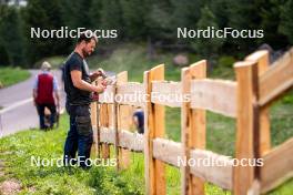 08.06.2023, Lavaze, Italy (ITA): Local workers on the skiroll track - Biathlon summer training, Lavaze (ITA). www.nordicfocus.com. © Barbieri/NordicFocus. Every downloaded picture is fee-liable.