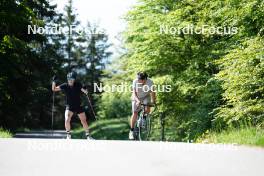 01.06.2023, La Feclaz, France (FRA): Lou Jeanmonnot (FRA), Cyril Burdet (FRA), coach Team France, (l-r) - Biathlon summer training, La Feclaz (FRA). www.nordicfocus.com. © Joly/NordicFocus. Every downloaded picture is fee-liable.